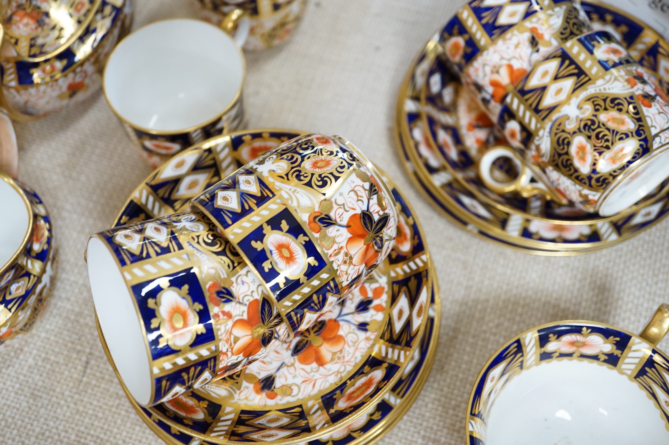 A group of Crown Derby, Davenport and Royal Crown Derby tea and coffee wares